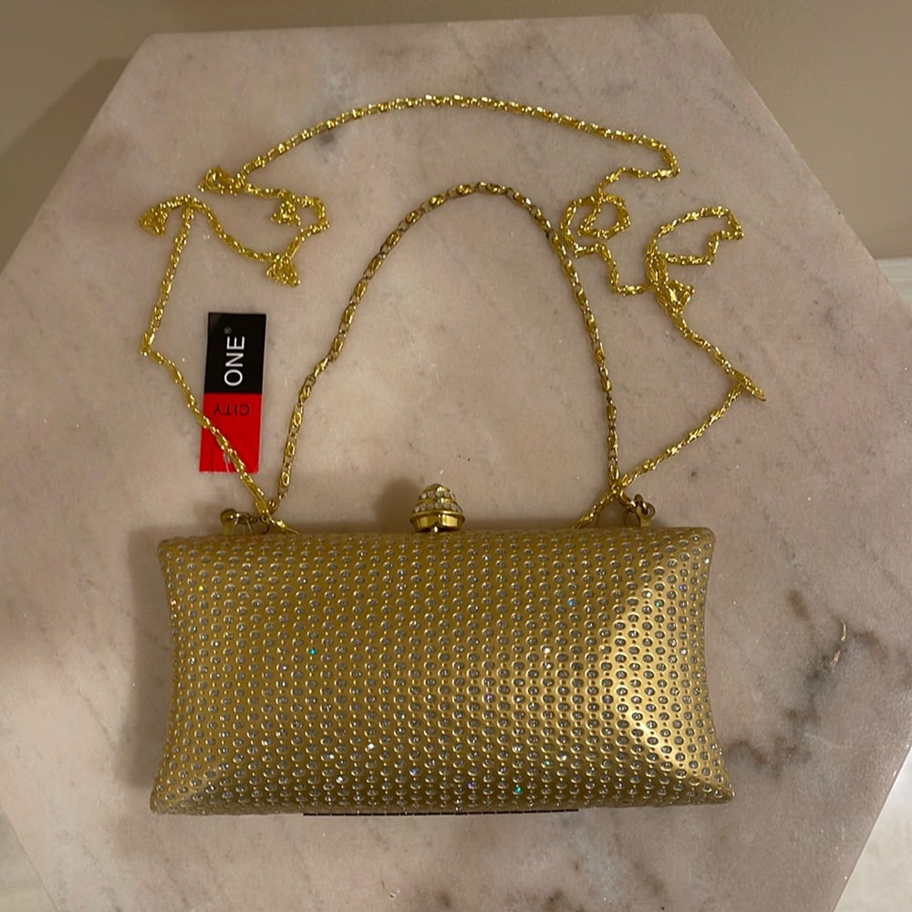 Eyelets Crystal and gold metal evening clutch